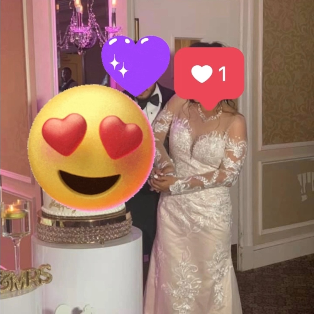 Wedding dress wore once for a few hours. Ivory color. Like NEW